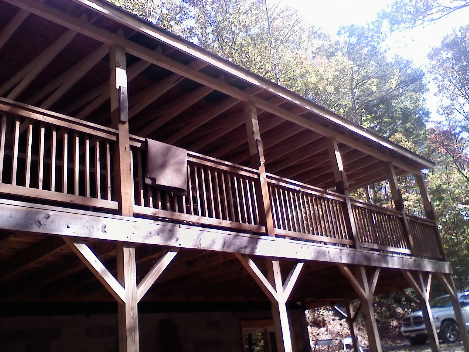 Timber framing under a new elevated porch and deck — Roof Leak Repair in Belle by Roofing Brothers